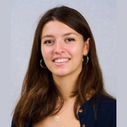 Headshot of Sandrine Chausson against a grey background