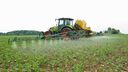 Tractor spraying pesticide