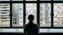 lonely person at window
