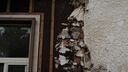 Exposed brick on top of building and roof