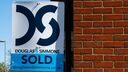 A sold real estate sign
