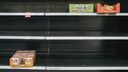 Empty shelves in supermarket as the result of panic buying
