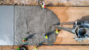 A birds eye view of cement being poured on the ground