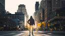 A photo of a man in the middle of the road in New York City