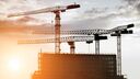 City skyline with cranes, buildings under contruction