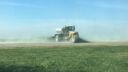 Tractor in grassy field