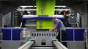A man operating the coating machine