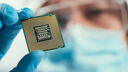 Stock image of researcher holding up chip