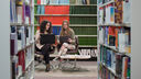 Image of two students in the Health Sciences Library