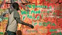 Graffiti reading “We need peace in Kenya” in Nairobi’s Kibera slum