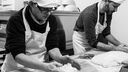 2 men bake - black and white photograph