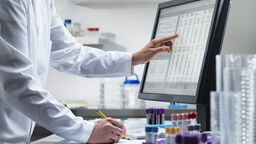 researcher performing clinical trial