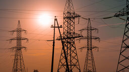 Energy pylons and a sunset - image 