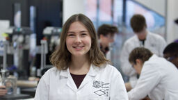 An image of a female student working in a Diamond lab.