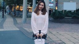 Student holding bag