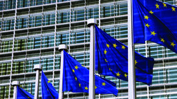 EU flags outside building 