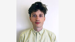 A headshot of Aiden