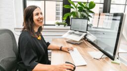 Woman sitting at desk in an office