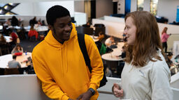 two computer science students chatting in the Diamond.