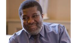 Profile of man looking to the left with smile