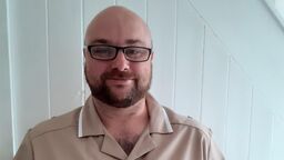 Simon McFarlane - nursing apprentice in uniform