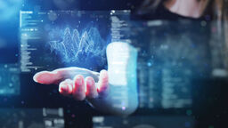 Young woman using futuristic digital interface display on dark background.