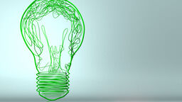 Visual of a green light bulb to indicate energy saving ideas.