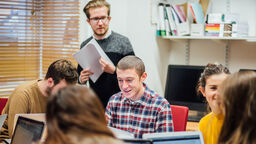 Image of classroom with students and teacher
