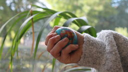 A student holding a stress ball