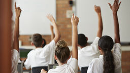 FoSS Raised hands in classroom