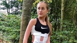 Olivia wearing her back brace