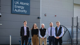 Representatives from UKAEA and the University of Sheffield stood outside UKAEA's facility in Rotherham