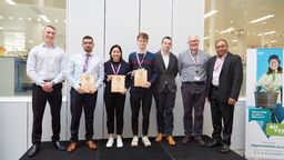 A group of people at a prize giving event