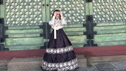 Music student in Korean attire 