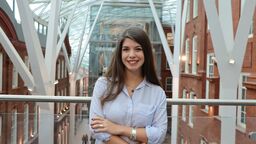 Dr Niki Trochoutsou - Young woman with long brown hair smiling