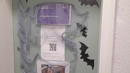 An office door covered in Halloween decorations