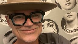 Dan in a hat smiling