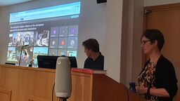 Paula Meth and Tom Goodfellow giving a presentation