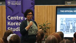 photograph of Monica Macias speaking