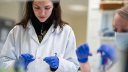 Student conducting research in a lab