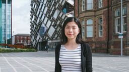 Ling Min Tan stood in front of The Diamond building