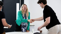 Two people shaking hands