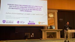 Mahmoud presenting at the conference