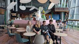 Sheffield SSCR team seated in a Moomin themed cafe