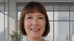  Alumni Carole Edwards in an offiice