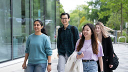 Students walking outside the wave