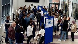 Students at a poster presentation