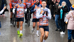 Kevin Sinfield crossing the finish line at SITraN
