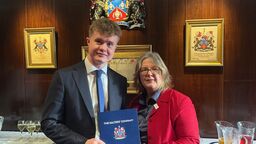 A student being presented with an award