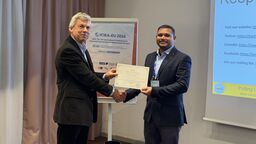 Rahul Yadav accepting a certificate